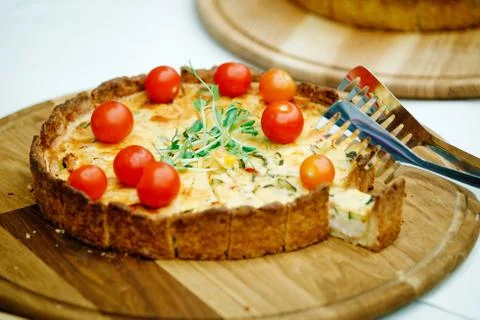 A cheesecake with tomatoes 스톡 사진