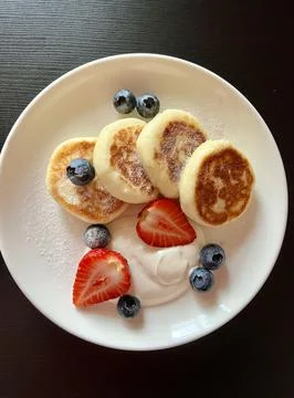 Cheesecakes for breakfast Stock Photos