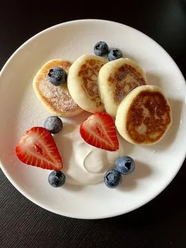 Cheesecakes for breakfast Stock Photos