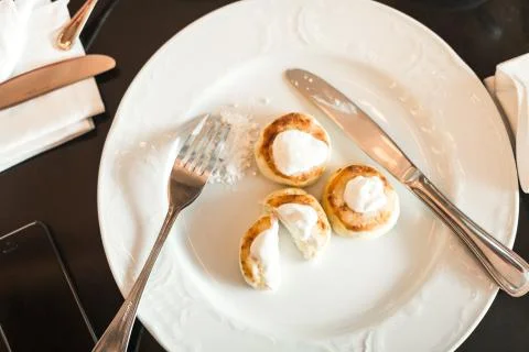 Cheesecakes for breakfast in the restaurant Stock Photos