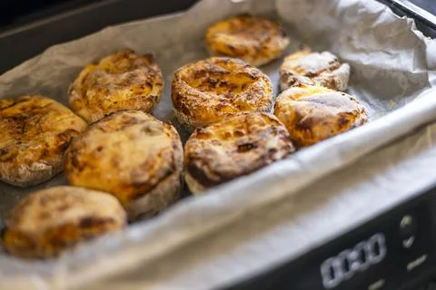 Cheesecakes cooked in an electric grill. Stock Photos
