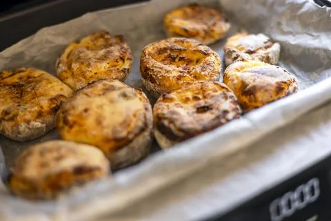 Cheesecakes cooked in an electric grill. Stock Photos