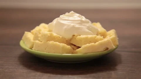 Cheesecakes watered with strawberry jam Stock Footage 130604559