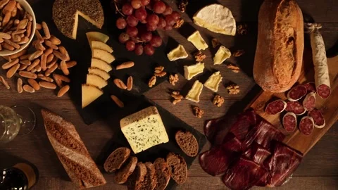 Cheeses, cold meats and breads Stock Footage 169628473
