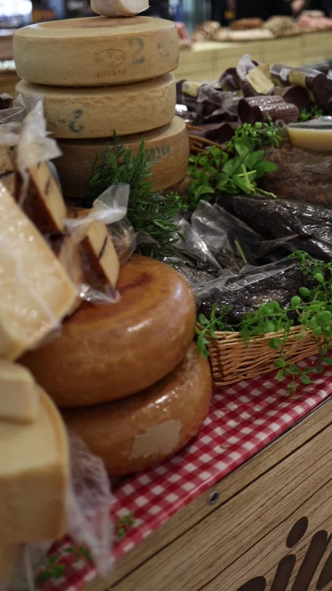 Cheeses in the store vertical video Stock Footage 289219453