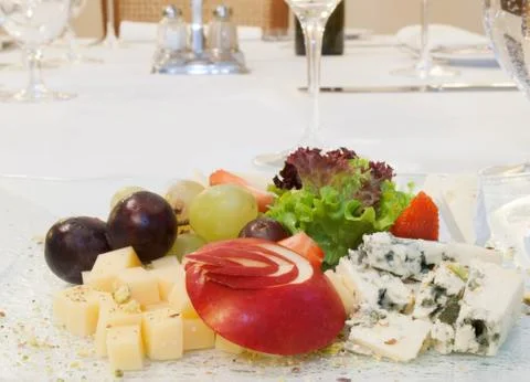 Cheesses with fruit Stock Photos