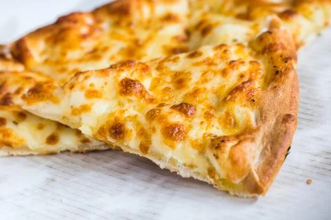 Cheesy garlic bread closeup Stock Photos