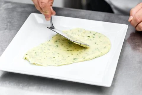 Chef add mashed potatoes on plate Stock Photos