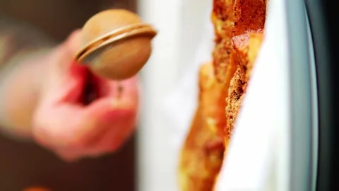 Chef adding cinnamon to homemade torrijas. Vertical video Stock Footage 264183281