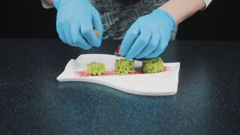 Chef adding finishing touch Stock Footage 88714551