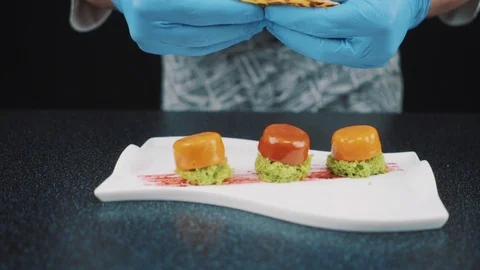 Chef adding finishing touch Stock Footage 88714752