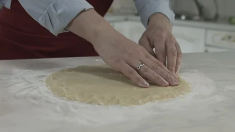 Chef Adding Flour on Dough and Rolling with Pin Stock Footage 160964066