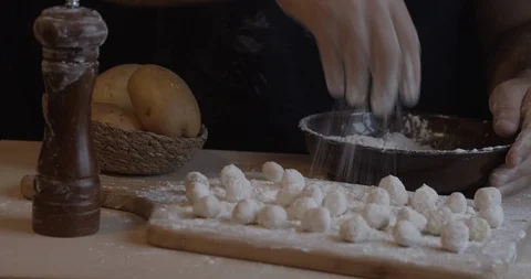 Chef adding the flour to the gnocchi Stock Footage 128288756