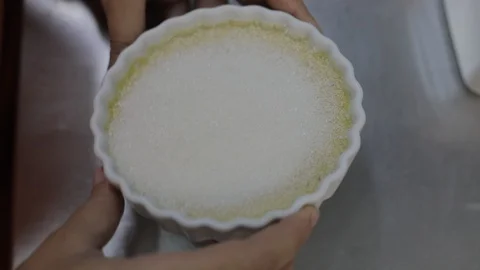 Chef Adding Sugar on Creme Brulee Stock Footage 129333897