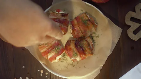 Chef adds chopped dill to the roasted rolls with chicken cooked meat Stock Footage 143593403