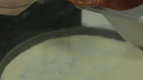The chef adds pizza sauce Stock Footage 81430659