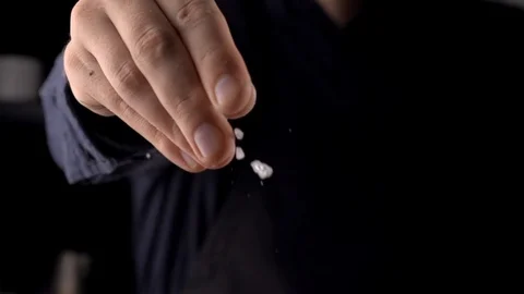 Chef adds salt to the dish, cooking in slow motion, cooking food in the kitchen Video stock 116337384