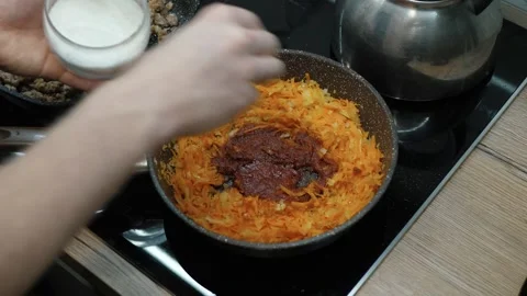 Chef adds salt Stock Footage 310411292