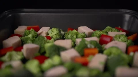 Chef adds sauce to the vegetables Stock Footage 64544500