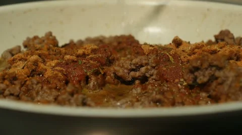 The chef adds water to stuffing mixes and all. 4k Stock Footage 64644190