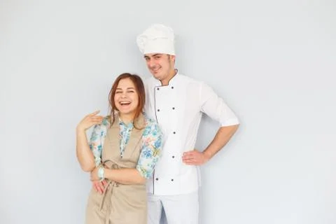 Chef and apprentice are flirting Stock Photos
