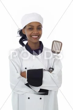 Chef and cooking utensil Stock Photos