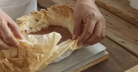 Chef apart a cake in a half and put one on another Stock Footage 75205393