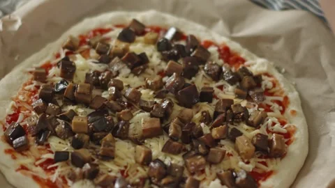 Chef in apron makes pizza with his hands putting the ingredients Stock Footage 280160116