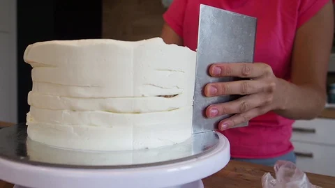 Chef assembling and scraping off creamy. Close up Stock Footage 128542698