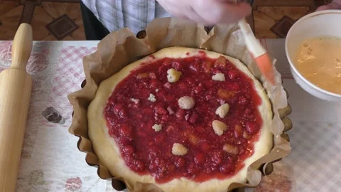 Chef baker preparing a pie with berries Stock Footage 164189082