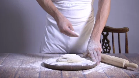 Chef. Baker. Sprinkle with flour dough. making pasta, pizza 스톡 동영상 90220537