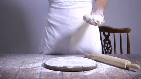 Chef. Baker. Sprinkle with flour dough. Making pasta, pizza. Video stock 90225934