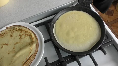 The chef bakes pancakes for breakfast Stock Footage 171982257