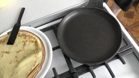 The chef bakes pancakes for breakfast Stock Footage 171984307