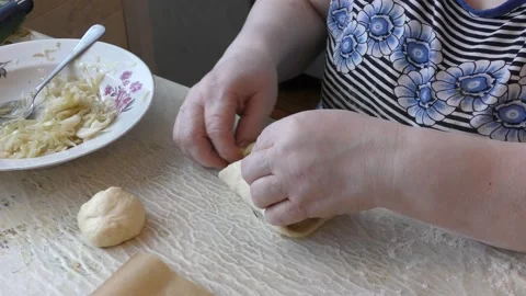 The chef bakes pies with cabbage. healthy food concept Видео 143249419
