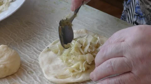 The chef bakes pies with cabbage. healthy food concept Stock Footage 143250339