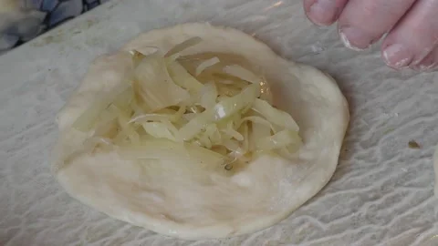 The chef bakes pies with cabbage. healthy food concept Vídeo Stock 143253703