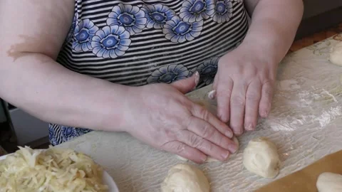 The chef bakes pies with cabbage. healthy food concept 動画素材 143257643