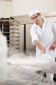 Chef baking in kitchen Stock Photos