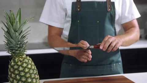 Chef balancing knife slow motion Stock Footage 237886704
