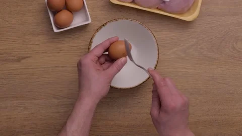 Chef beats eggs, plan from above Stock Footage 163884882