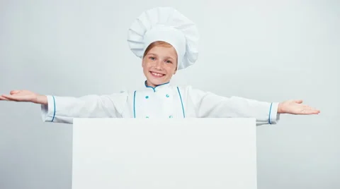 Chef behind the whiteboard and smiling at camera. Isolated on white Video stock 67178519