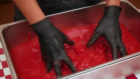 Chef in Black Gloves Mixing Bright Red Tomato Sauce or Food Coloring in Professi Stock Footage 331636305