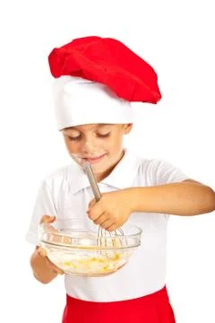 Chef boy mixing dough Foto stock