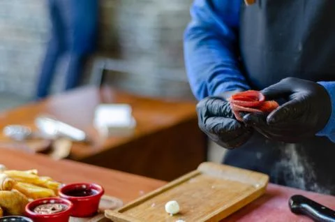 Chef is breakfast preparing in the restaurant Stock Photos