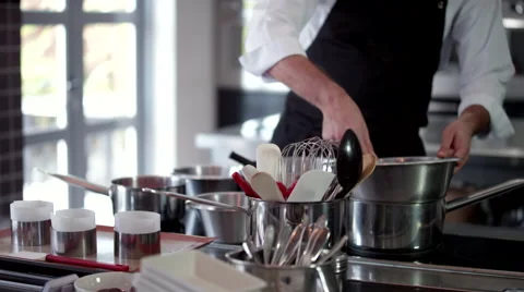 Chef breaking eggs at kitchen. Stock Footage 64117502