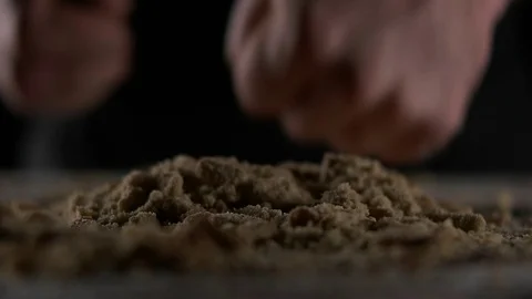 Chef breaks biscuit by fists Stock Footage 69919356