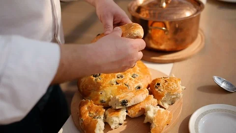 Chef breaks bread into pieces, close-up Stock Footage 91264929