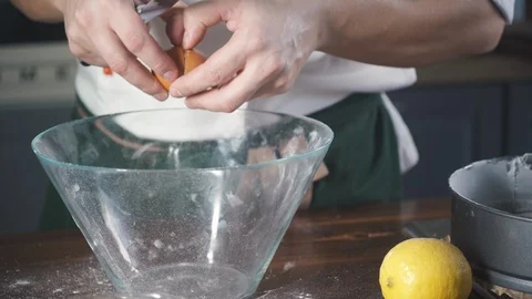 Chef breaks eggs to make omelette or dough for a pie, cake, pizza. 스톡 동영상 124751081