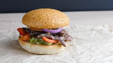 Chef builds burger. Preparing of the burger Stock Footage 86178151